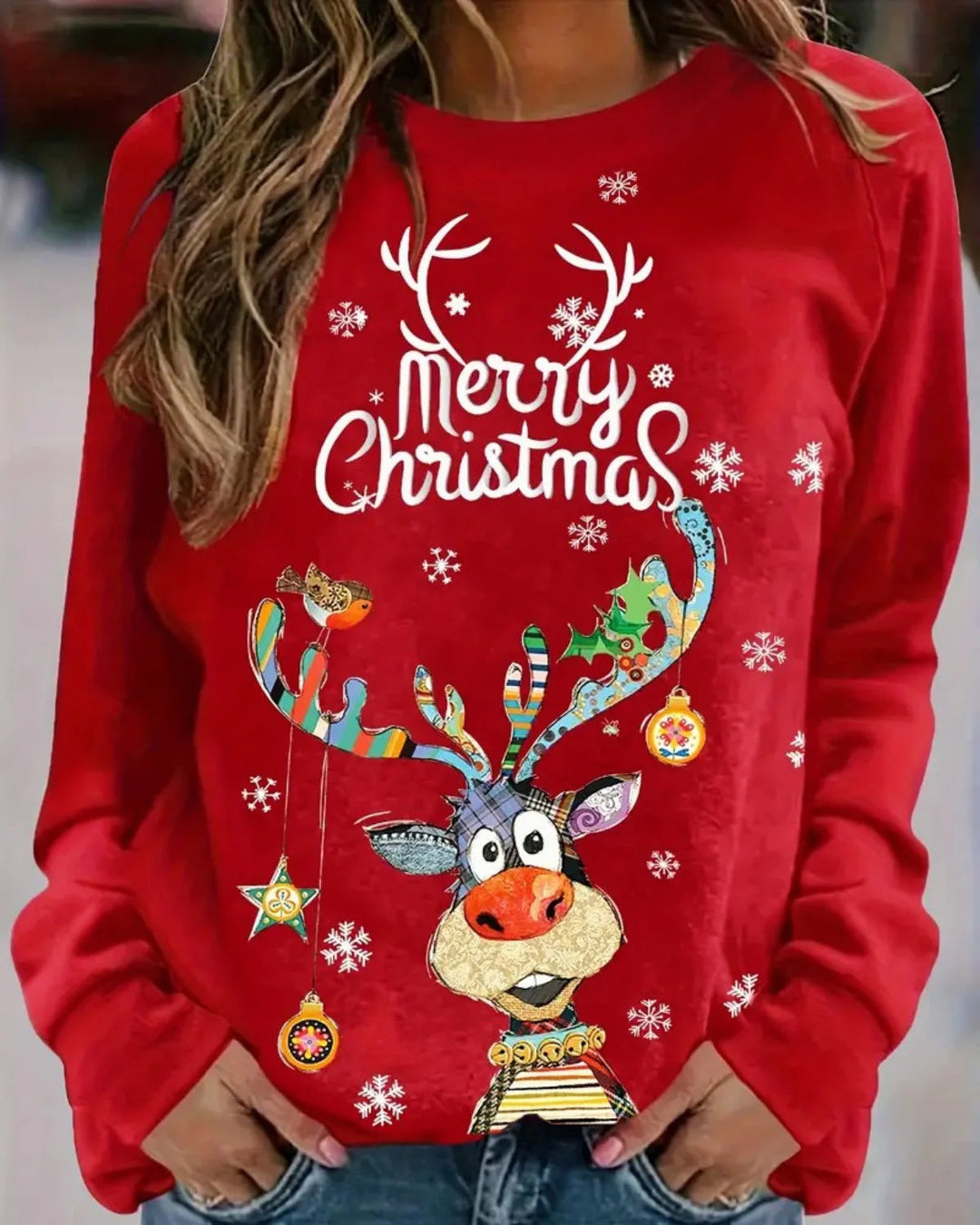 Dames kersttrui met feestelijke rendierprint en ronde hals. Ideaal voor warme winterdagen.