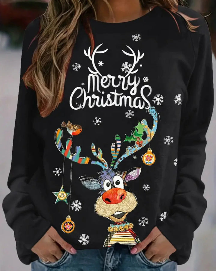 Dames kerstkleding: Warme trui met iconische rendierprint. Comfortabel en stijlvol voor winterdagen.