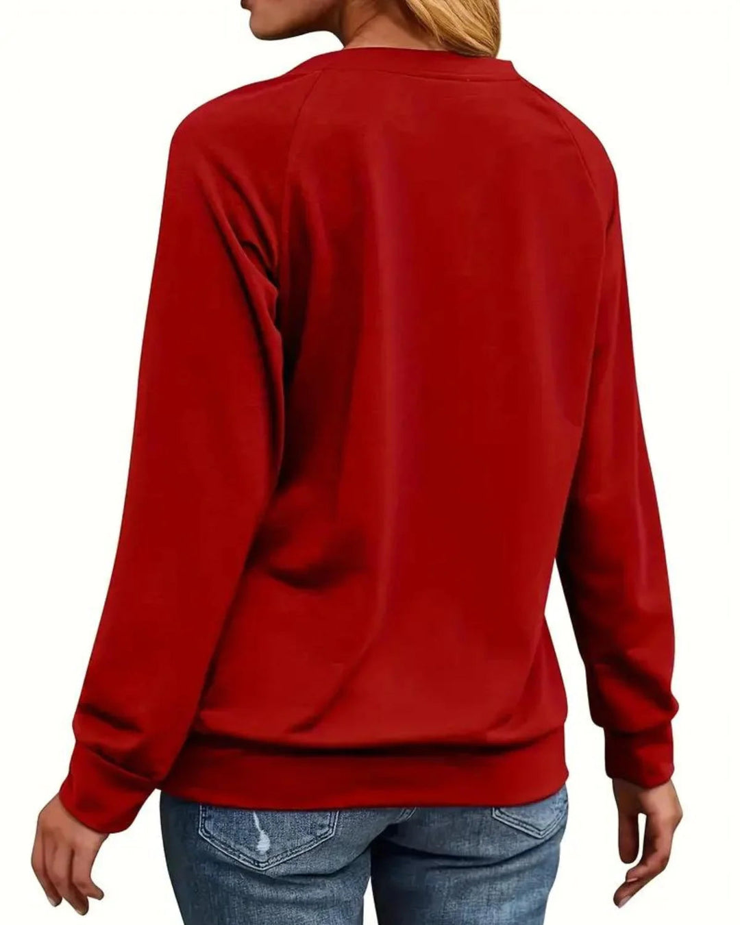 Vrolijke dames kersttrui met gedetailleerde rendierprint. Perfecte aanvulling op je kerstkleding.