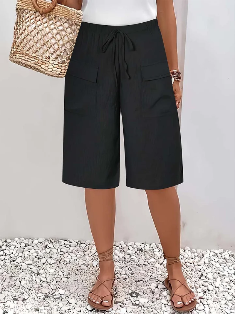 Trendy dames korte broek met elastische tailleband, ideaal voor een relaxte en comfortabele zomerlook.