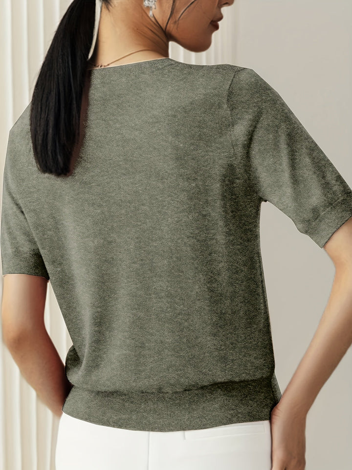 Zwarte elegante dames sweater, korte mouw, ronde hals, voor veelzijdige dameskleding.