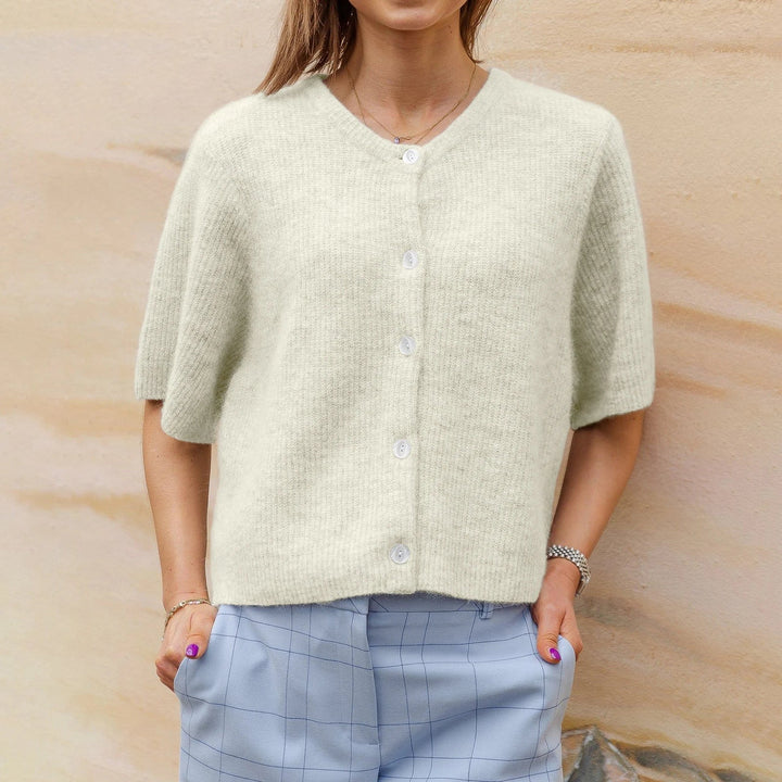 Dames korte mouwen vest in trendy streetwear stijl. Perfect voor casual lente/zomer mode.
