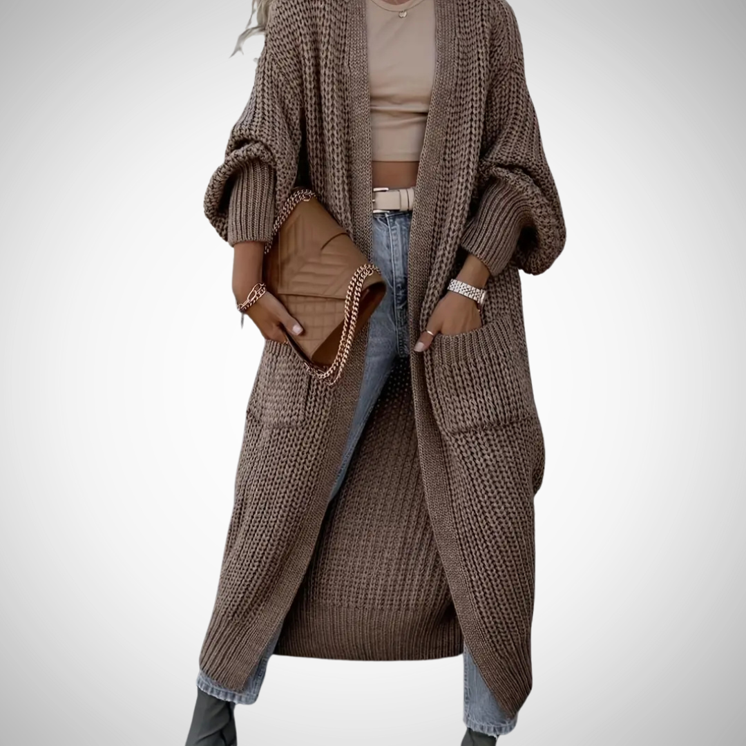 Dames lang open cardigan vest met zakken, ideaal voor laagjes in herfst/winter. Comfortabel en stijlvol.