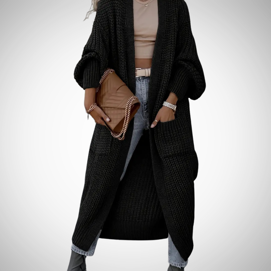 Comfortabel dames lang opencardigan vest met steekzakken, heerlijk zacht voor koude dagen. Casual wintermode.