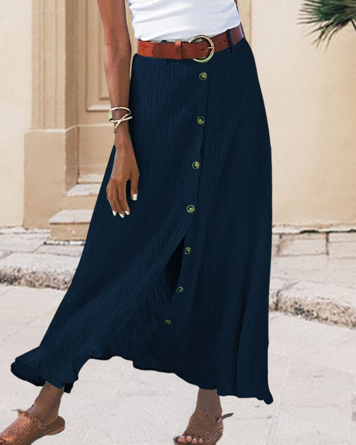 Casual groene dames lange rok met knoopsluiting en luchtige kreukstof, perfect voor warme zomerdagen.