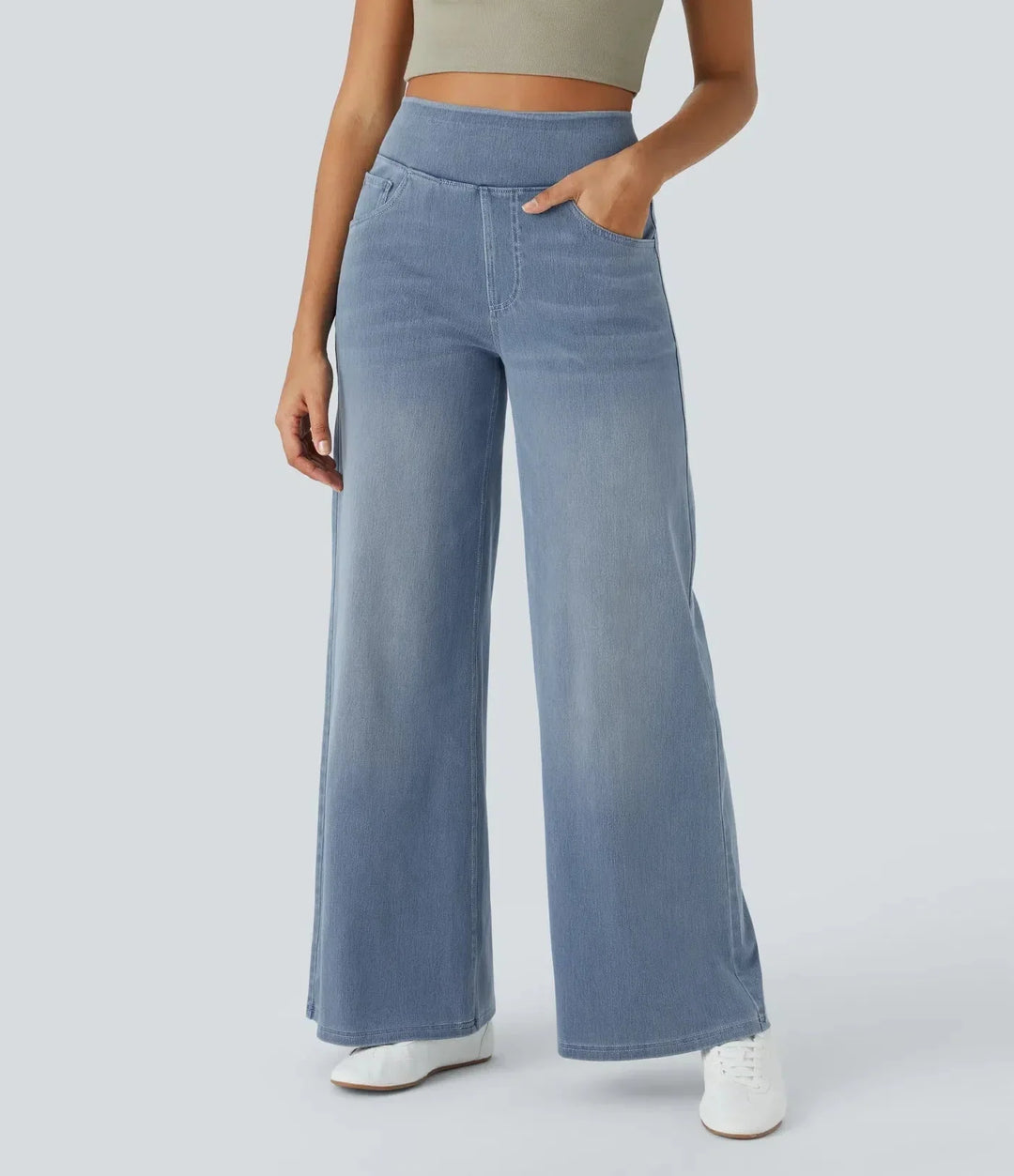 Trendy zomerbroek: lichtblauwe dames wide leg jeans met hoge taille en elastische band.