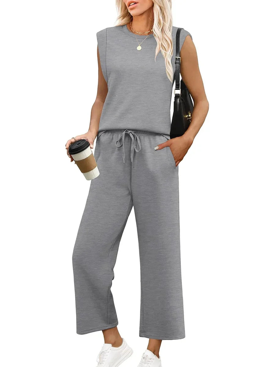 Stijlvolle dames loungewear set met mouwloze top en elegante wide-leg broek.