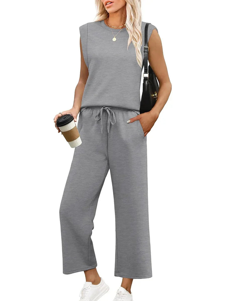 Stijlvolle dames loungewear set met mouwloze top en elegante wide-leg broek.