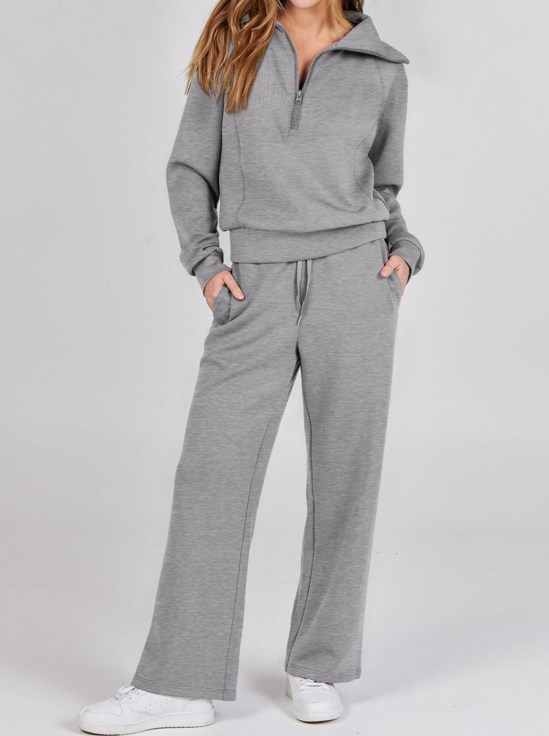 Dames loungewear set met lange mouwen, ritssluiting, comfortabel & modern, perfect voor thuis.