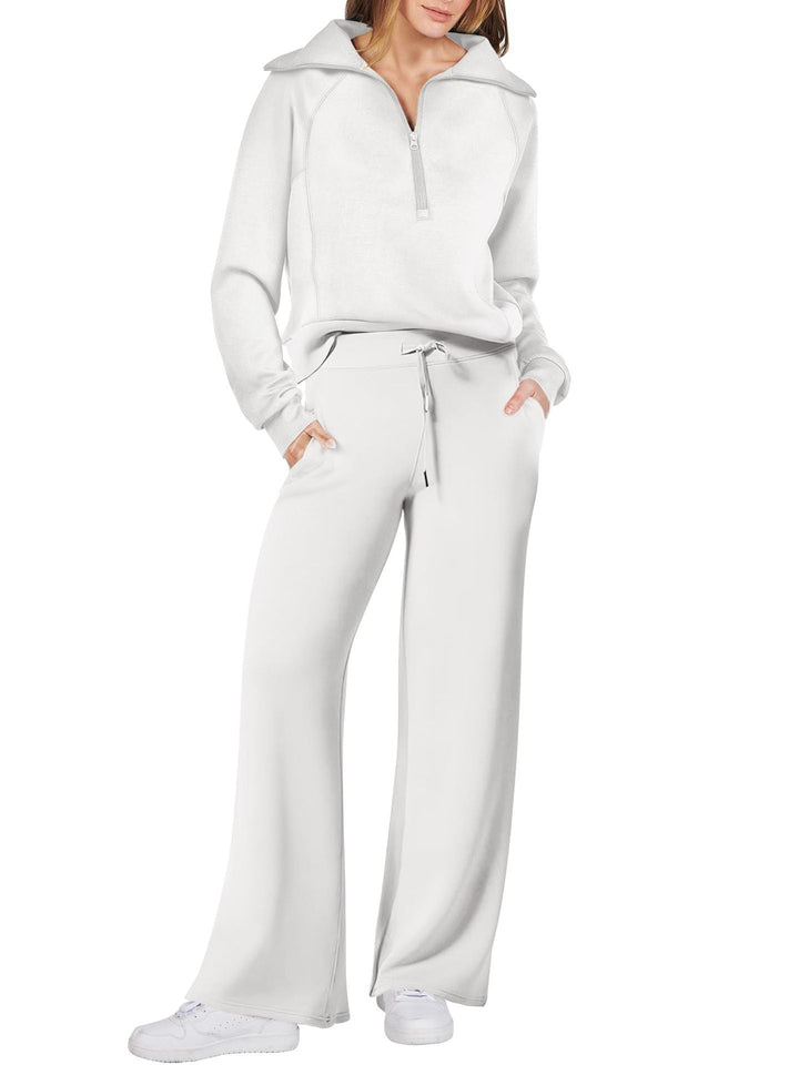 Trendy dames lounge set met lange mouwen en ritssluiting, modern en comfortabel voor thuis.
