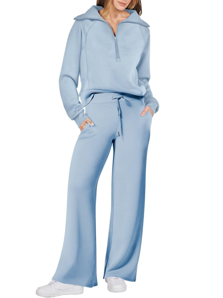 Elegante dames loungewear set met lange mouwen en ritssluiting, stijlvol & comfortabel thuis.