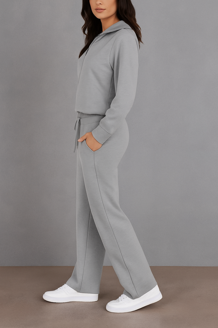 Tweedelige dames loungewear set met lange mouwen en ritssluiting, comfortabele thuisoutfit.