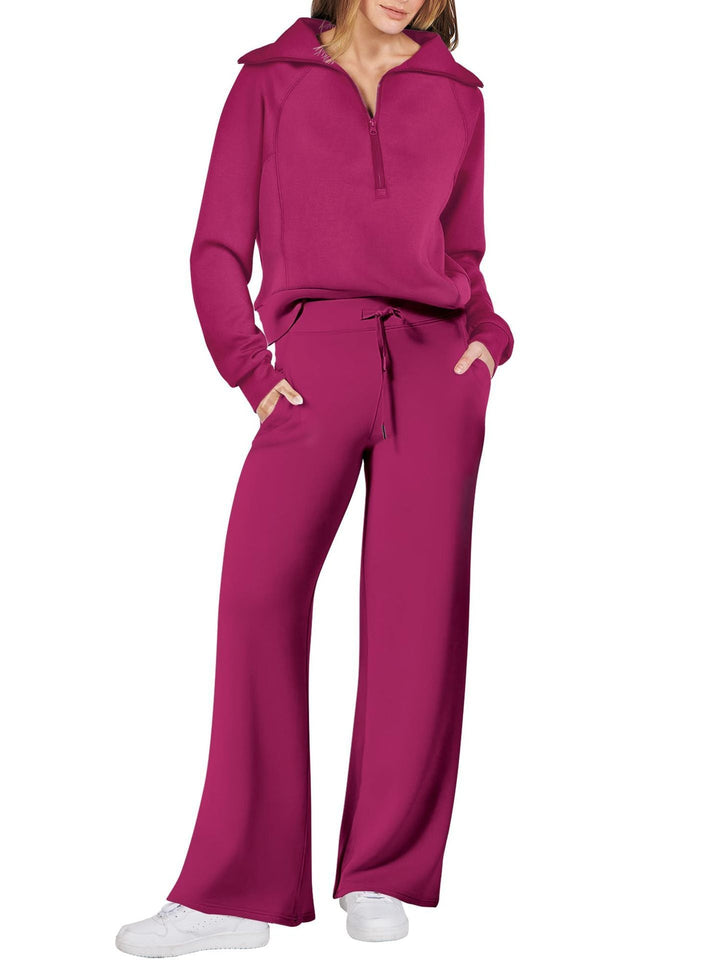 Stijlvolle dames lounge set met ritssluiting en lange mouwen, een complete tweedelige thuisoutfit.