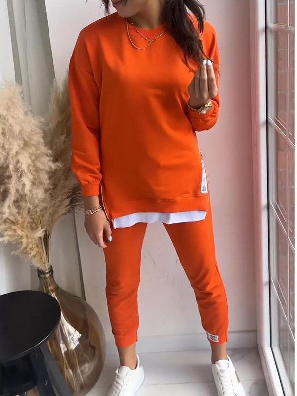 "Dames loungewear set, zachte katoen-polyester mix, relaxed sweatshirt en taps toelopende broek, stijlvol en comfortabel."