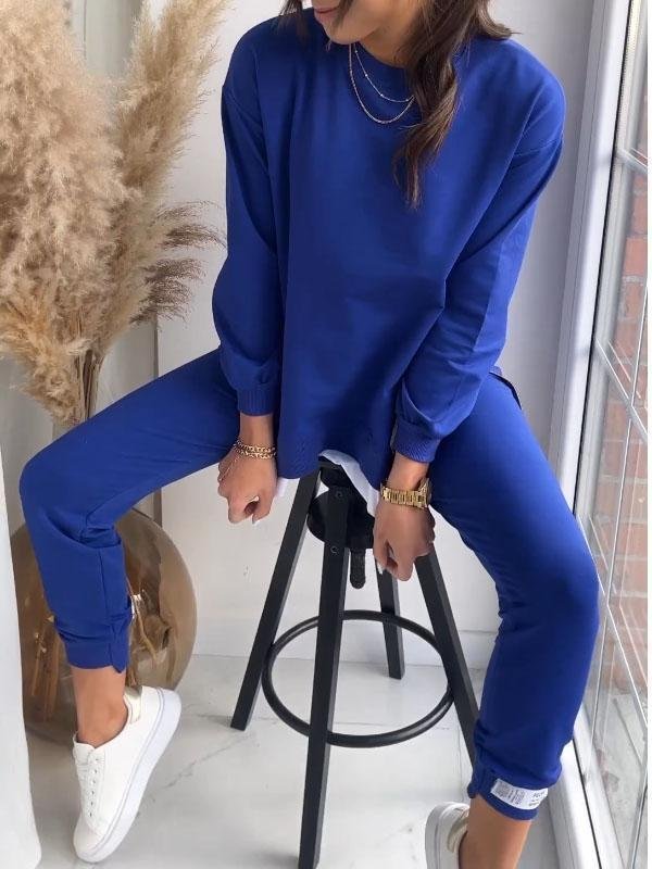 "Dames loungewear set, zachte katoen-polyester mix, relaxed sweatshirt en taps toelopende broek, stijlvol en comfortabel."