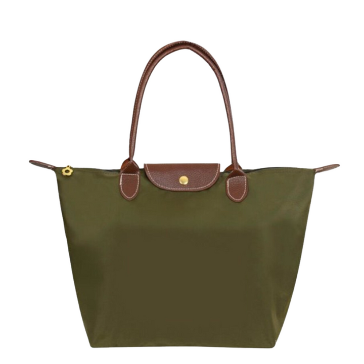 Waterafstotende nylon dames schoudertas met luxe leren details. Perfecte, stijlvolle draagtas.