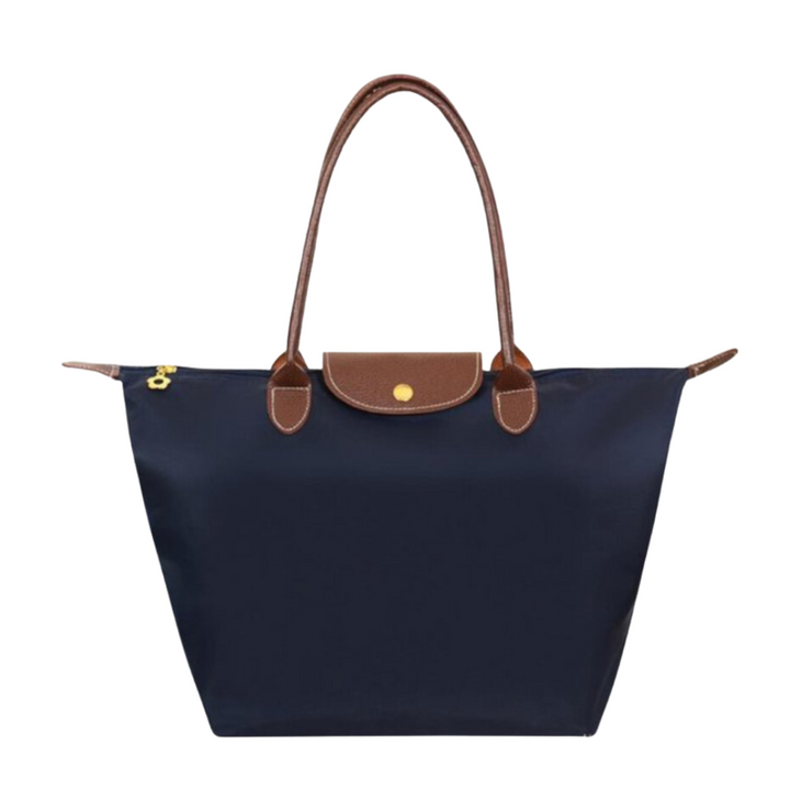 Duurzame waterafstotende dames draagtas, stevig nylon met luxe leren basis. Praktische schoudertas.