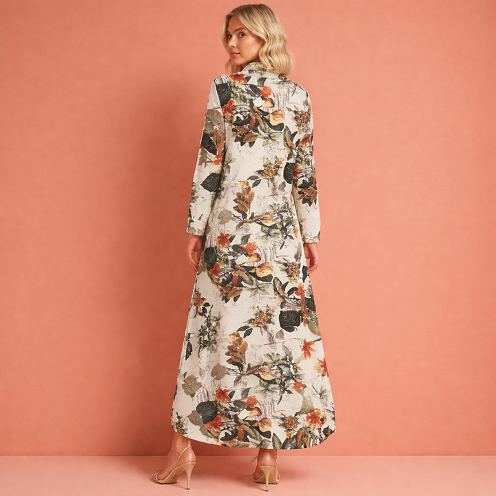 Comfortabele dames maxi jurk met vrolijke bloemenprint en praktische knoopsluiting, veelzijdig voor elke gelegenheid.