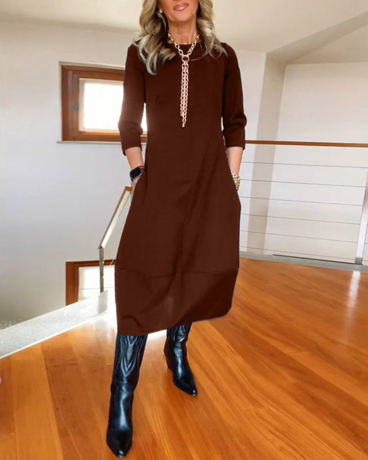 Must-have dames maxi jurk met lange mouwen en ronde hals, ideaal voor elke wintergarderobe.