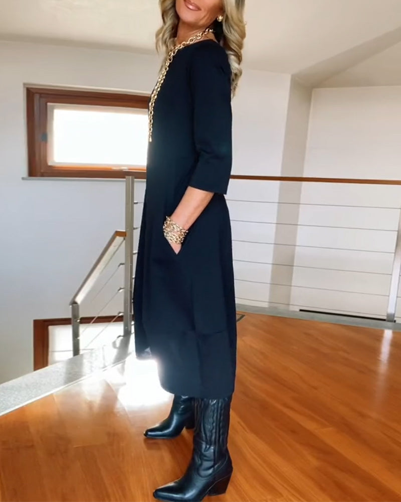 Stijlvolle dames maxi jurk met lange mouwen en ronde hals, geschikt voor zowel casual als chique gelegenheden.