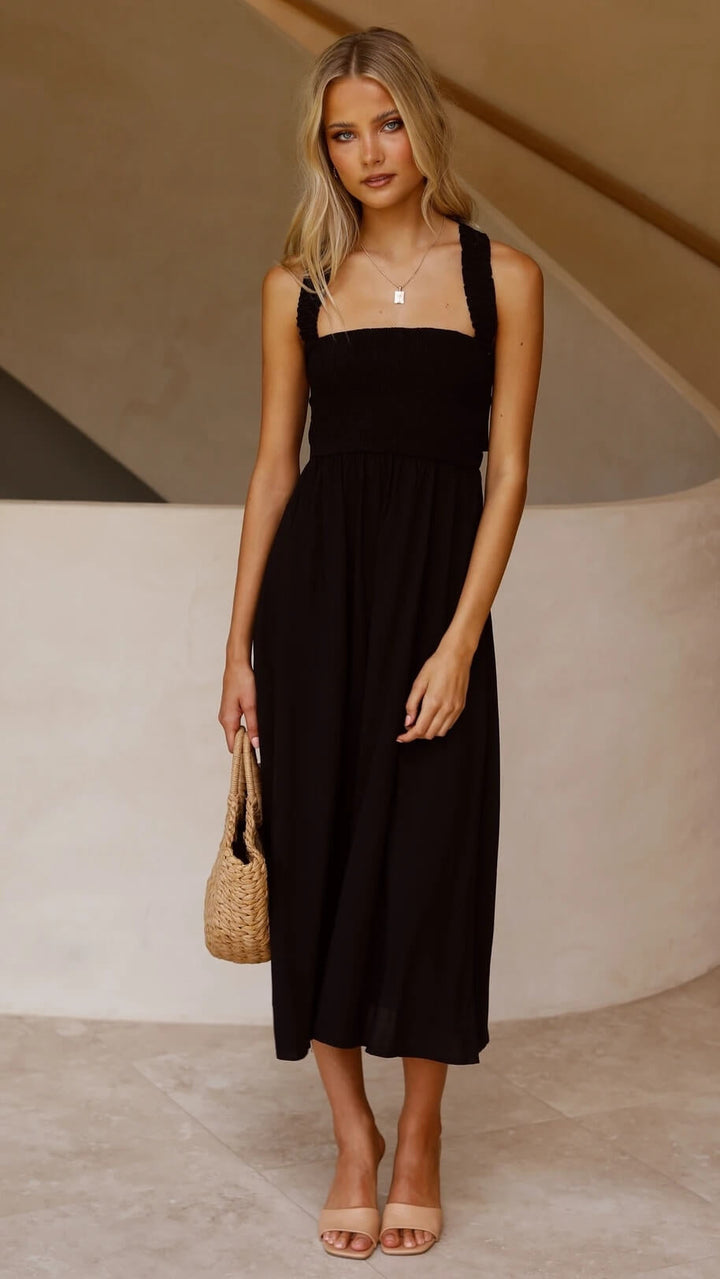 Open rug maxi jurk met smock en vierkante hals; een perfecte, elegante dames zomerjurk voor elke gelegenheid.