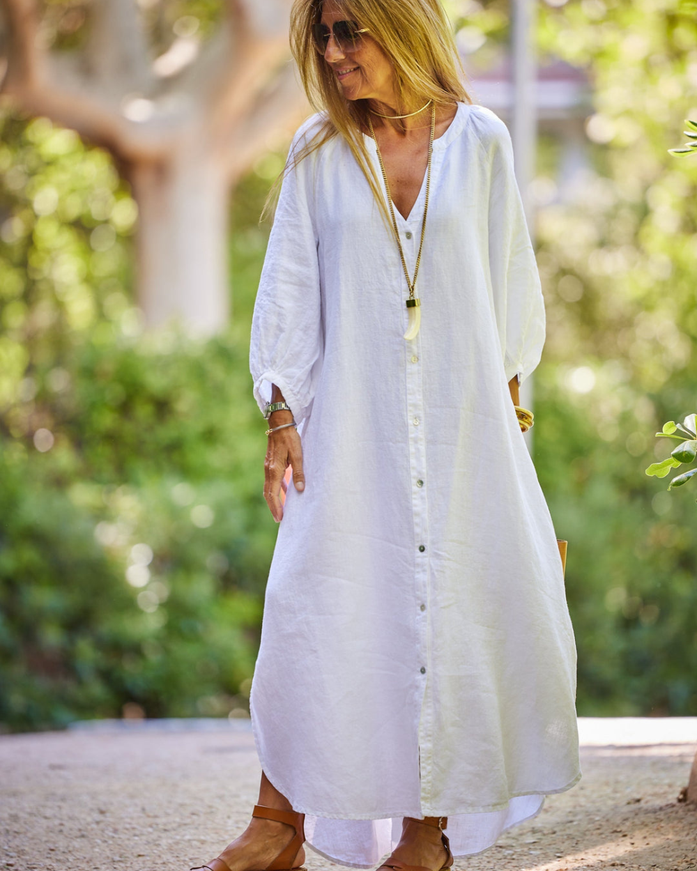 Elegante dames maxi-jurk met lange mouwen, perfect voor zomerse dagen en avonden.