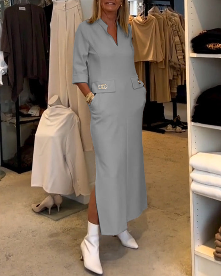 Chique dames zomer maxijurk met diepe V-hals, praktische zakken en een elegante look.