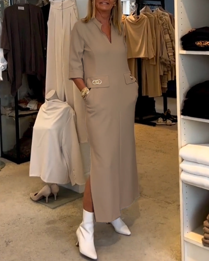 Elegante dames maxijurk met diepe V-hals, praktische zakken en 3/4 mouwen.