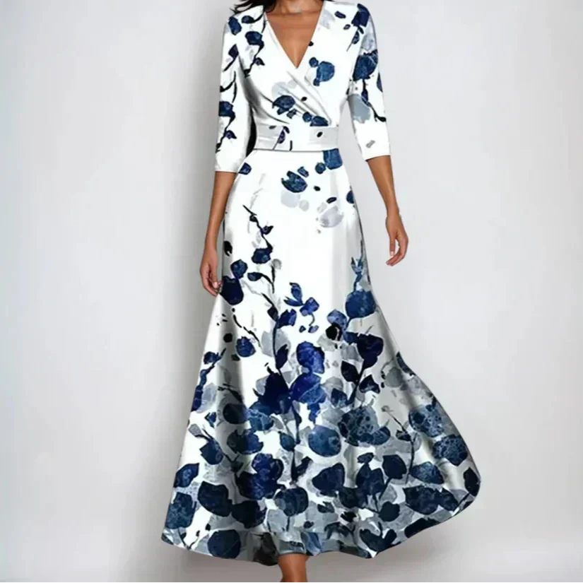 Comfortabele dames maxijurk met levendige bloemenprint, V-hals en driekwart mouwen, perfect voor casual of chic.