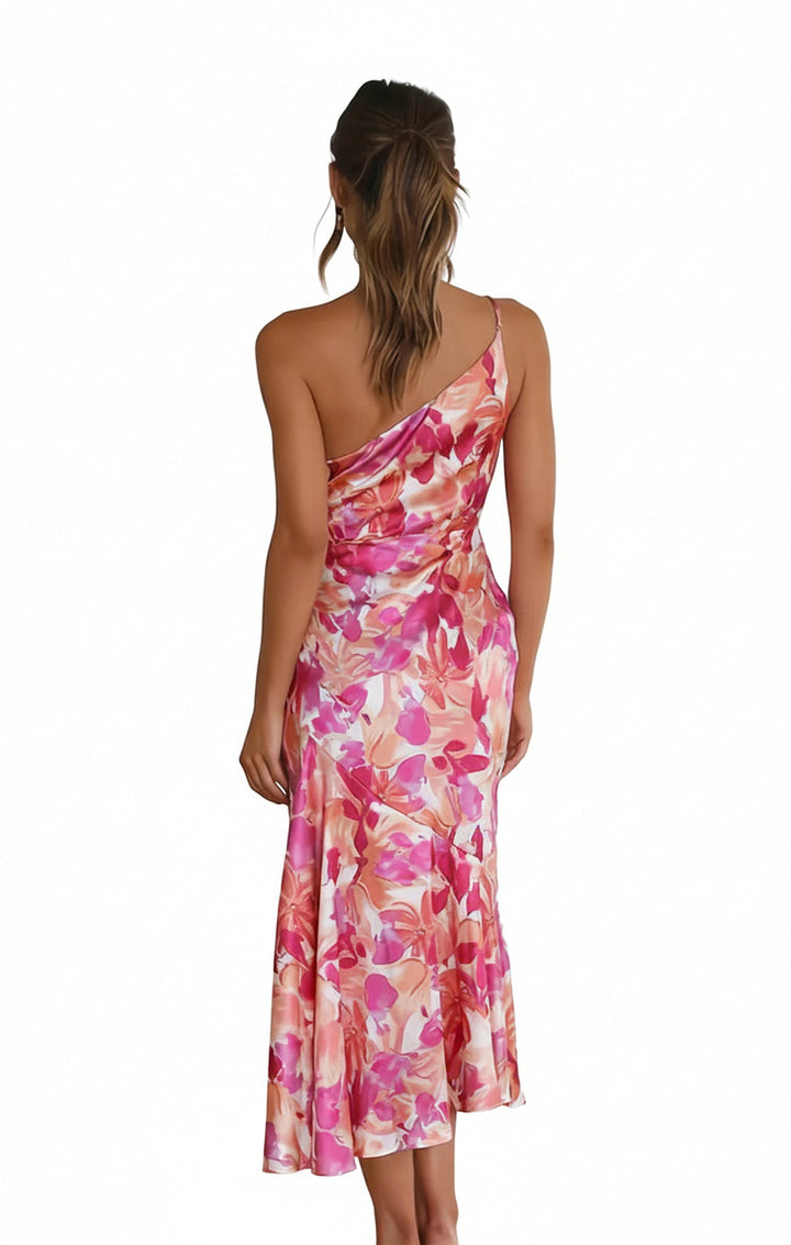 Dames midi jurk met eenschouder en levendige bloemenprint, perfect voor zomerse feesten.