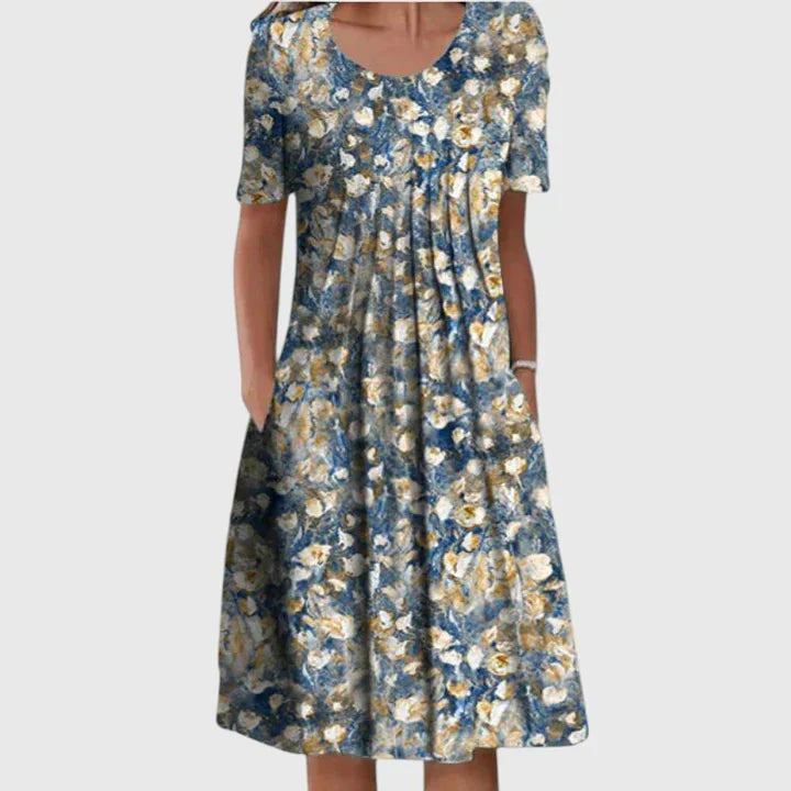 Comfortabele casual dames midi jurk met bloemenprint en korte mouw, ideaal voor een relaxte zomerlook.