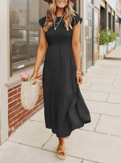 Casual dames zomerjurk, midi lengte, met trendy vlindermouwen voor dagelijkse mode.