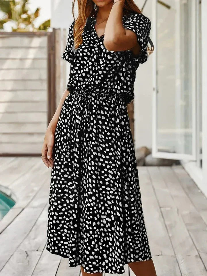 Trendy midi zomerjurk voor vrouwen, met korte mouwen, casual maar elegant, perfecte pasvorm.