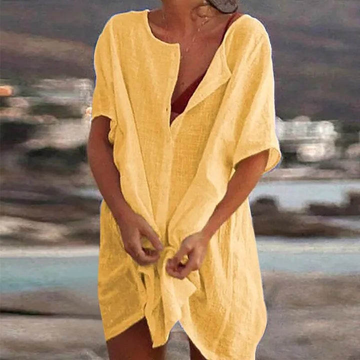 Comfortabele dames mini jurk met flatterende pasvorm en speelse uitlopende zoom. Een must-have voor de zomer.