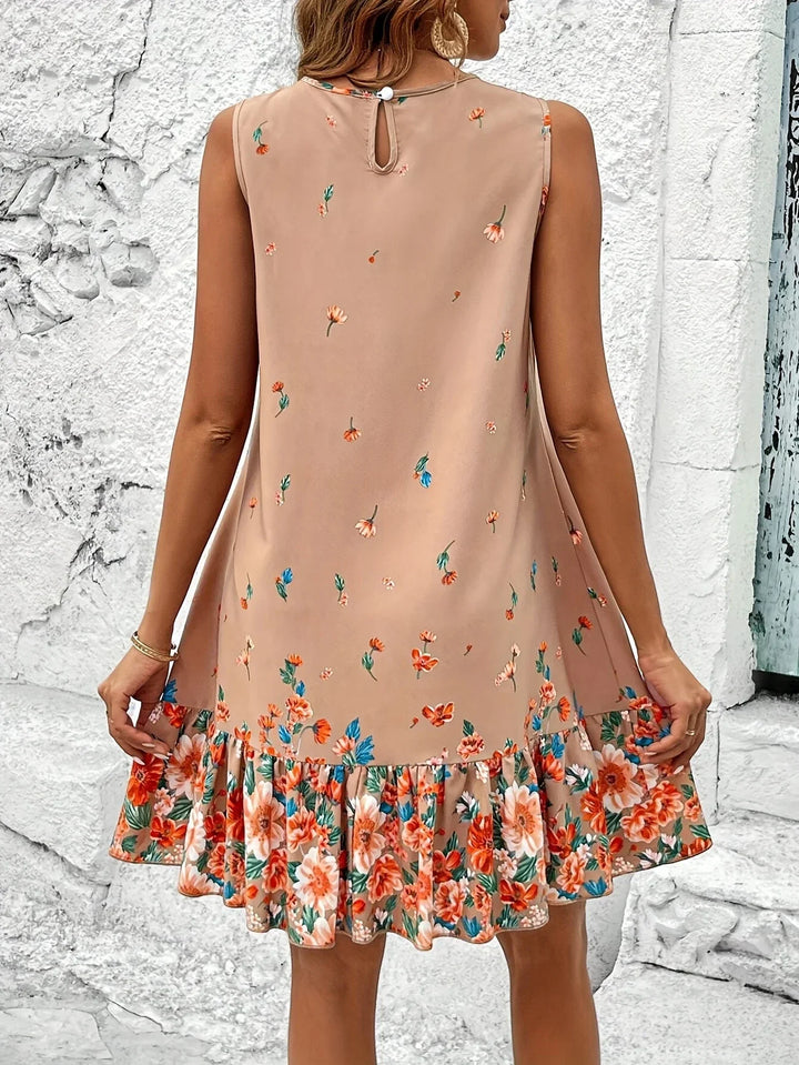 Luchtige mouwloze dames zomerjurk met bloemenprint, comfortabel en casual voor een warme vakantie.