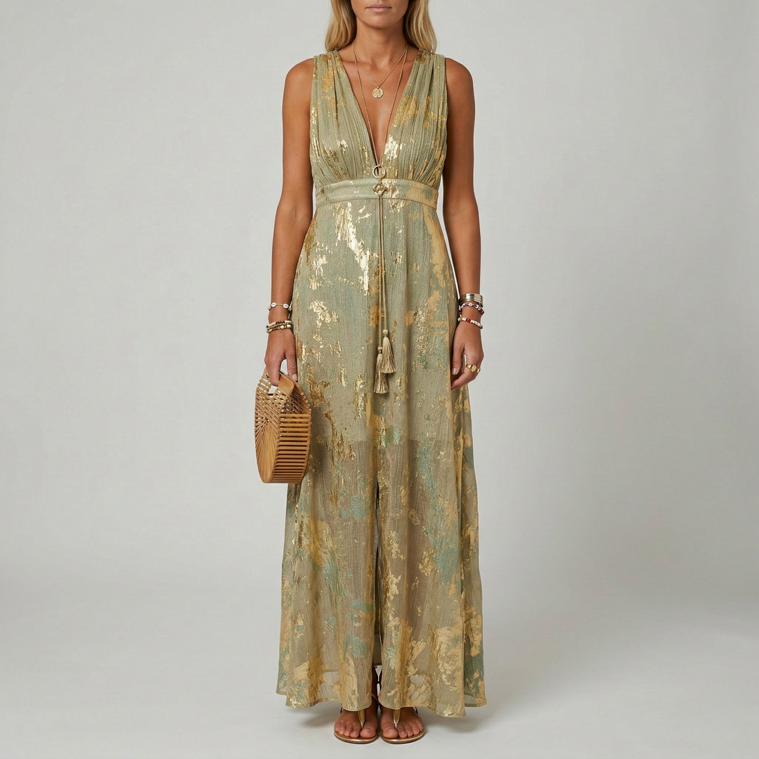 Mouwloze maxi jurk met diepe V-hals en exclusieve gouden print; een perfecte elegante avondjurk.