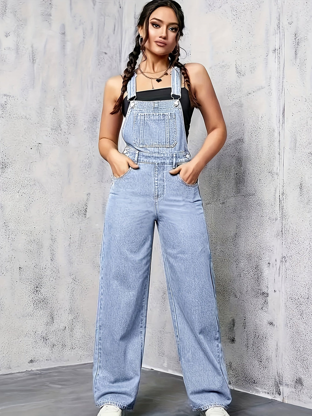 Dames mouwloze spijkeroverall met wijde pijpen, ideaal voor zomer en lente. Comfortabele casual chic blauwe jumpsuit.
