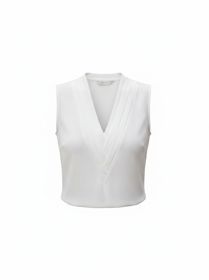 Dames mouwloze V-hals top met elegante plooidetails, perfect voor zomerse dagen en avonden.