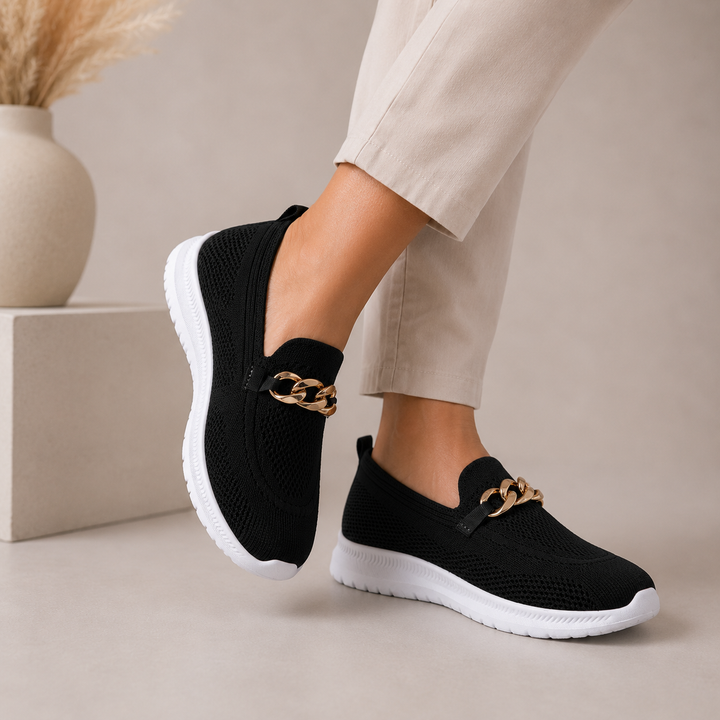 Zwarte orthopedische dames instappers, perfect voor comfort en ondersteuning, ademend en casual.
