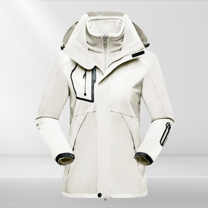 Dames outdoorjas met verstelbare kap, perfect voor wandelen en buitensporten. Comfortabel en weerbestendig.