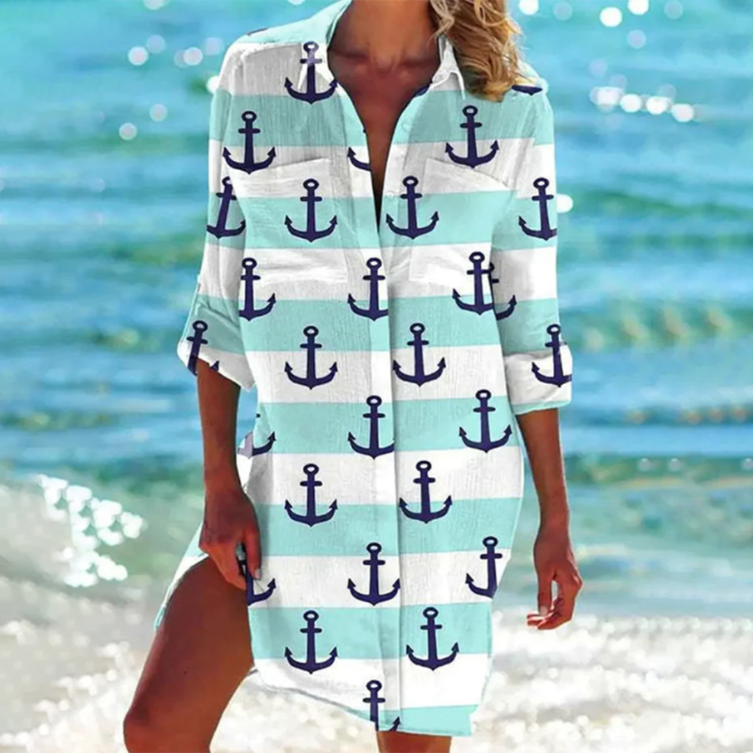 Trendy dames zomerjurk: een lange overhemdjurk in A-lijn model. Comfortabele blousejurk voor casual dagen.