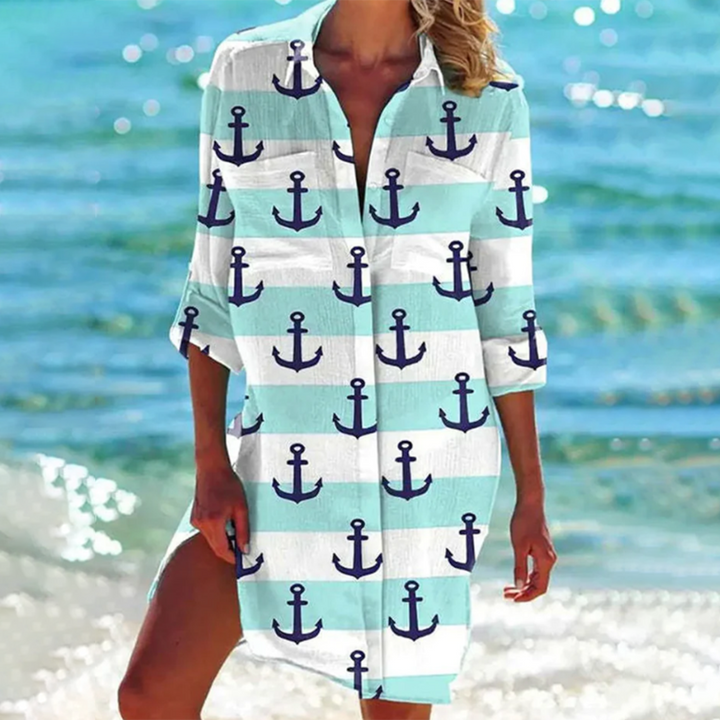 Trendy dames zomerjurk: een lange overhemdjurk in A-lijn model. Comfortabele blousejurk voor casual dagen.