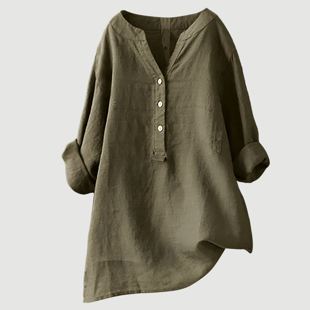 Trendy damesblouse met oversized pasvorm, V-hals en lange mouwen, ideaal voor een stijlvolle outfit.