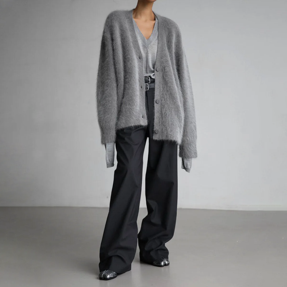 Trendy oversized damesvest met knopen, perfect voor een chique casual look.