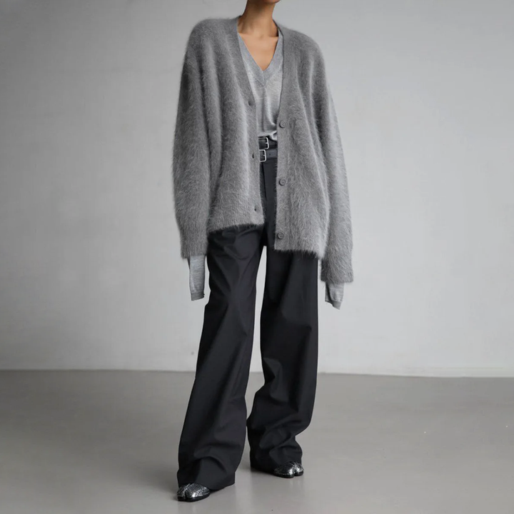 Trendy oversized damesvest met knopen, perfect voor een chique casual look.