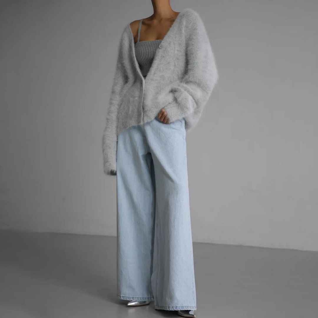 Comfortabel oversized damesvest, gebreide stof, een essentieel mode-item voor de winter.