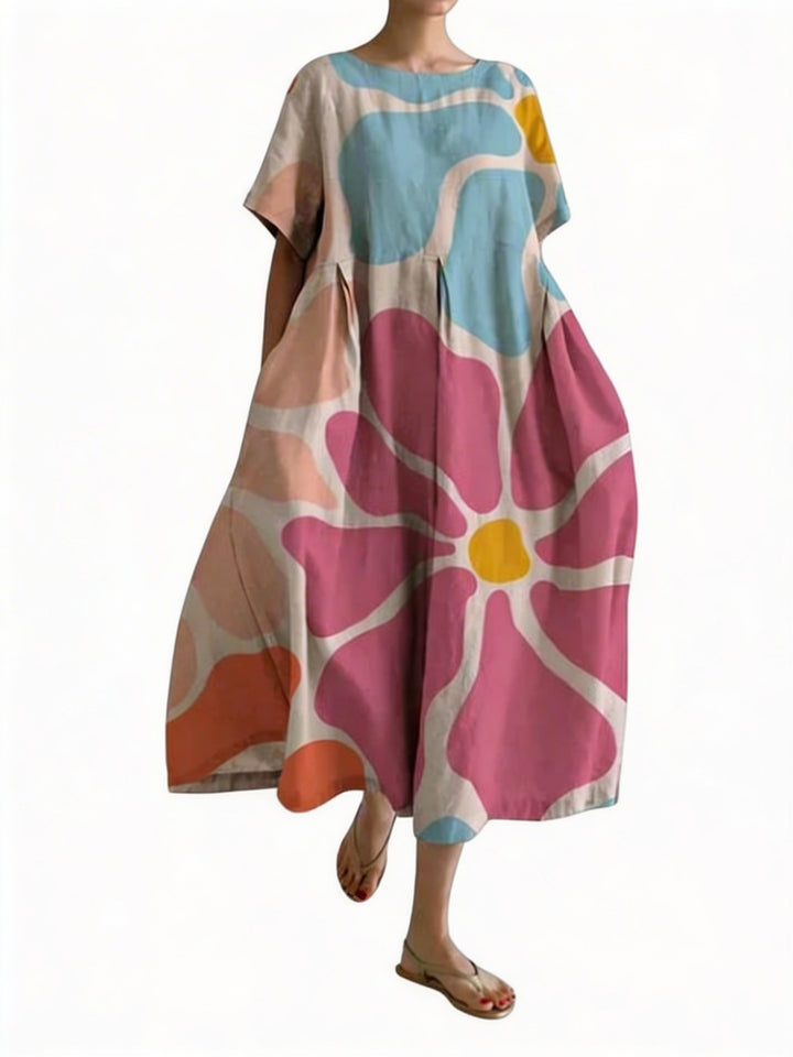 Dames oversized midi-jurk met ronde hals, korte mouwen en comfortabele pasvorm voor de zomer.