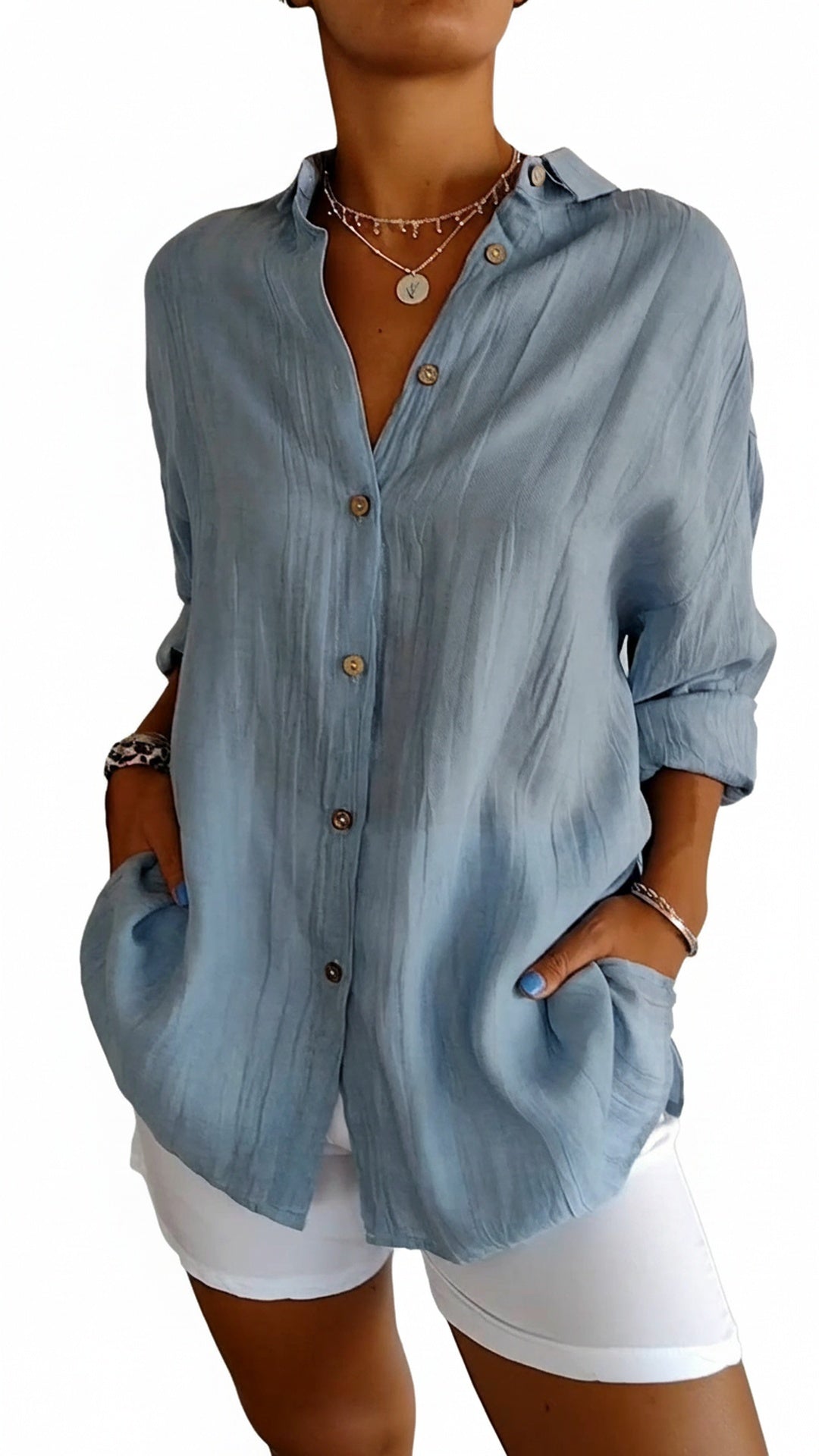 Dames oversized shirt met lange mouwen, zijzakken en knoopsluiting. Comfortabel en trendy.