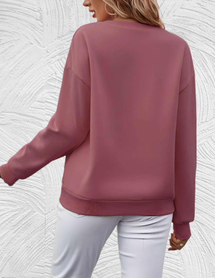 Modieus oversized dames sweatshirt; stijlvolle slogan print voor een trendy en comfortabele look.