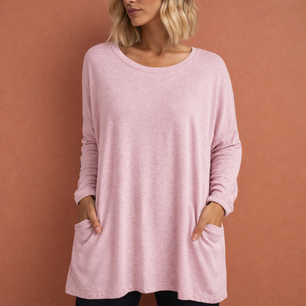 Losvallende dames tuniek met praktische zakken, comfortabele lange top ideaal voor dagelijks gebruik en vrouwenmode.